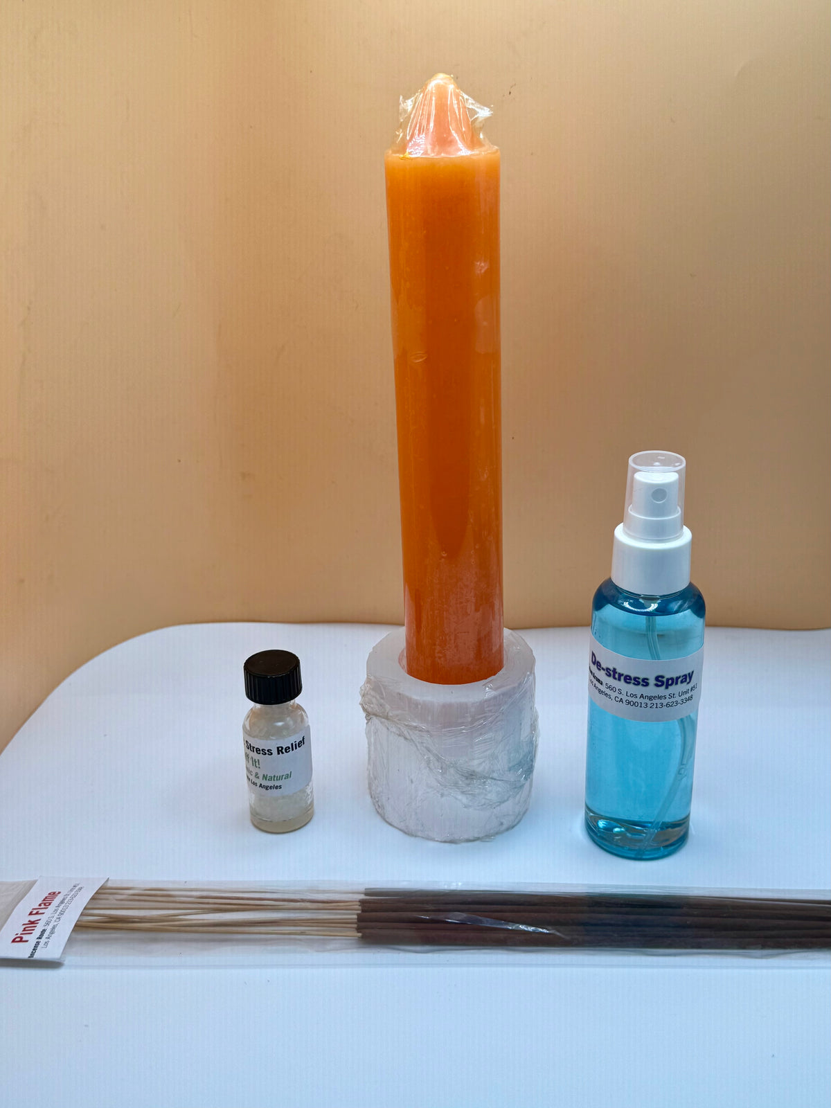 De-Stress and Unwind Bundle with aromatherapy, incense, candle holder, taper candles, and spray