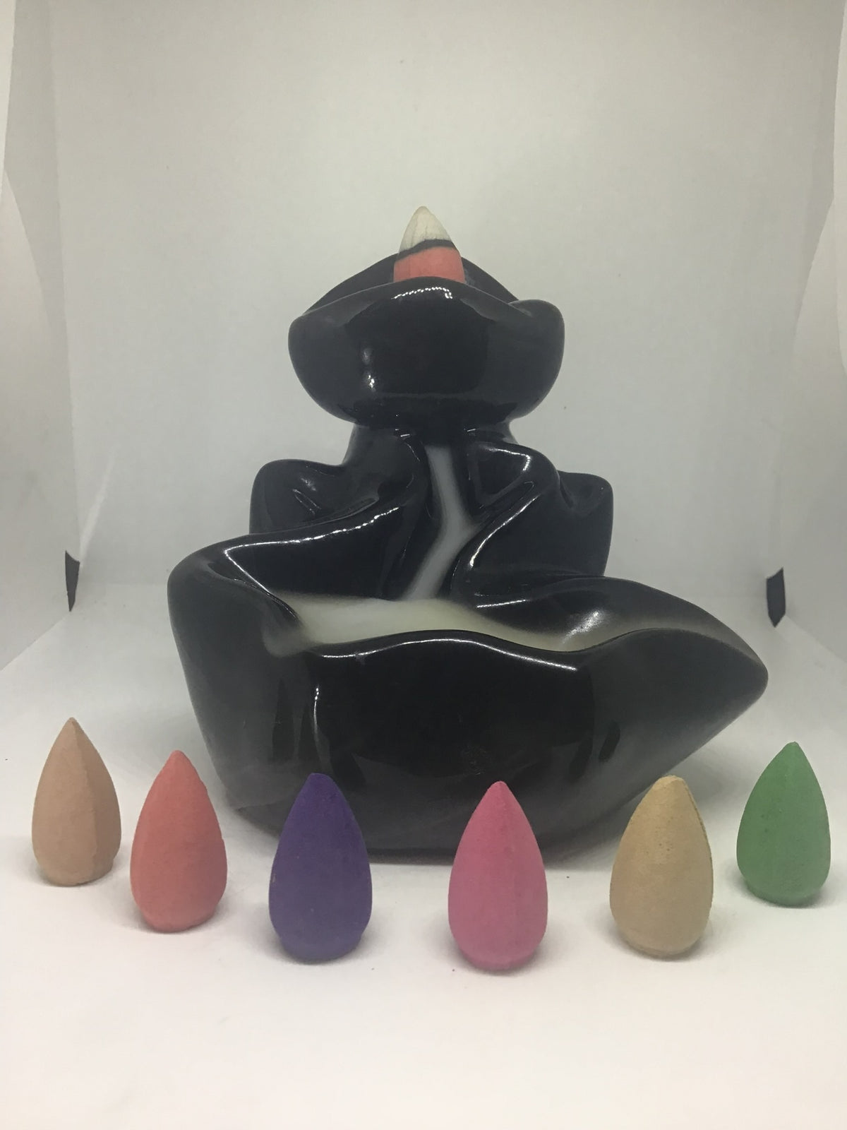 Ceramic backflow incense burner with multicolored cones - Incense Route